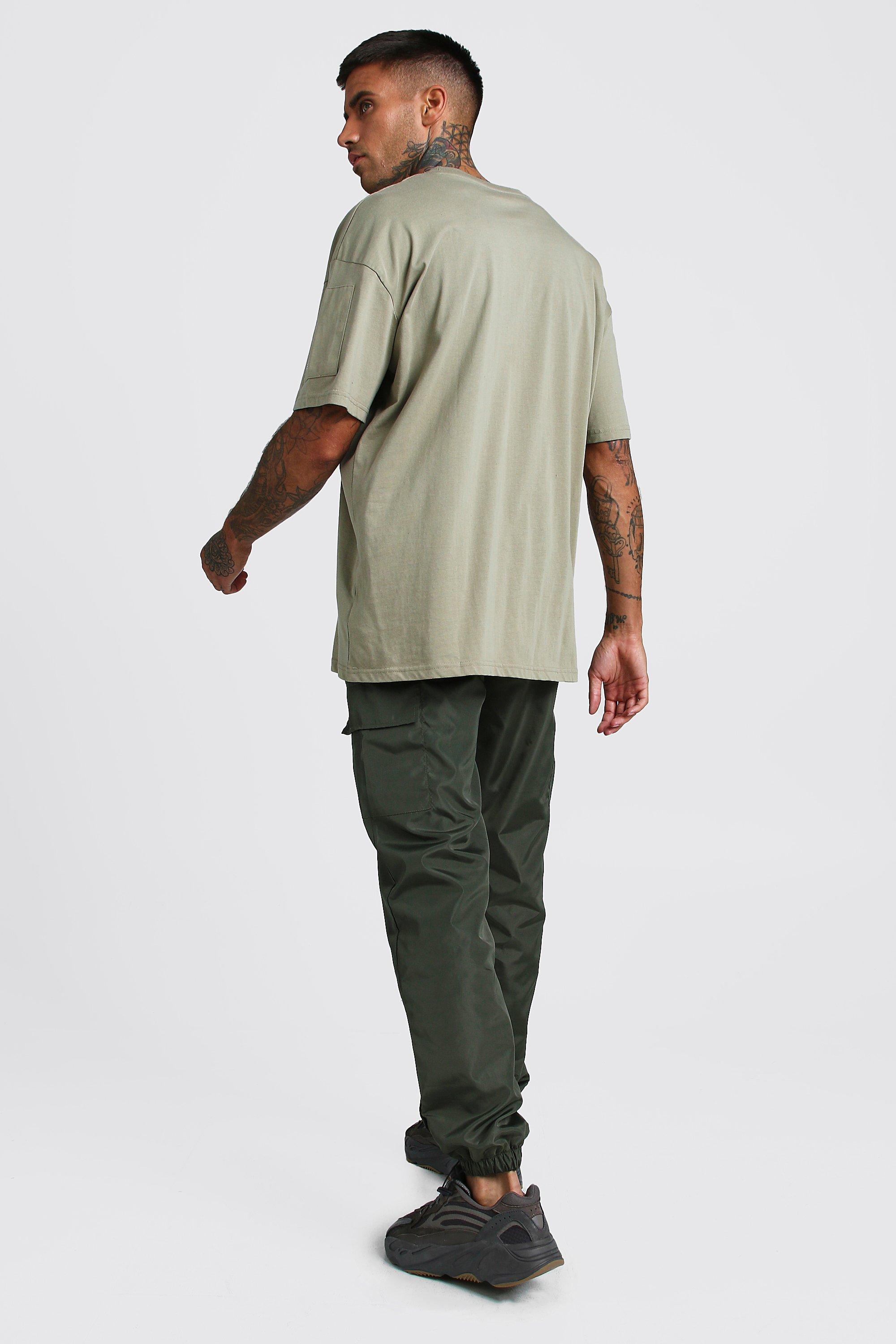 https://media.boohoo.com/i/boohoo/mzz40802_khaki_xl_1/shell-cargo-joggers-with-bungee-hem