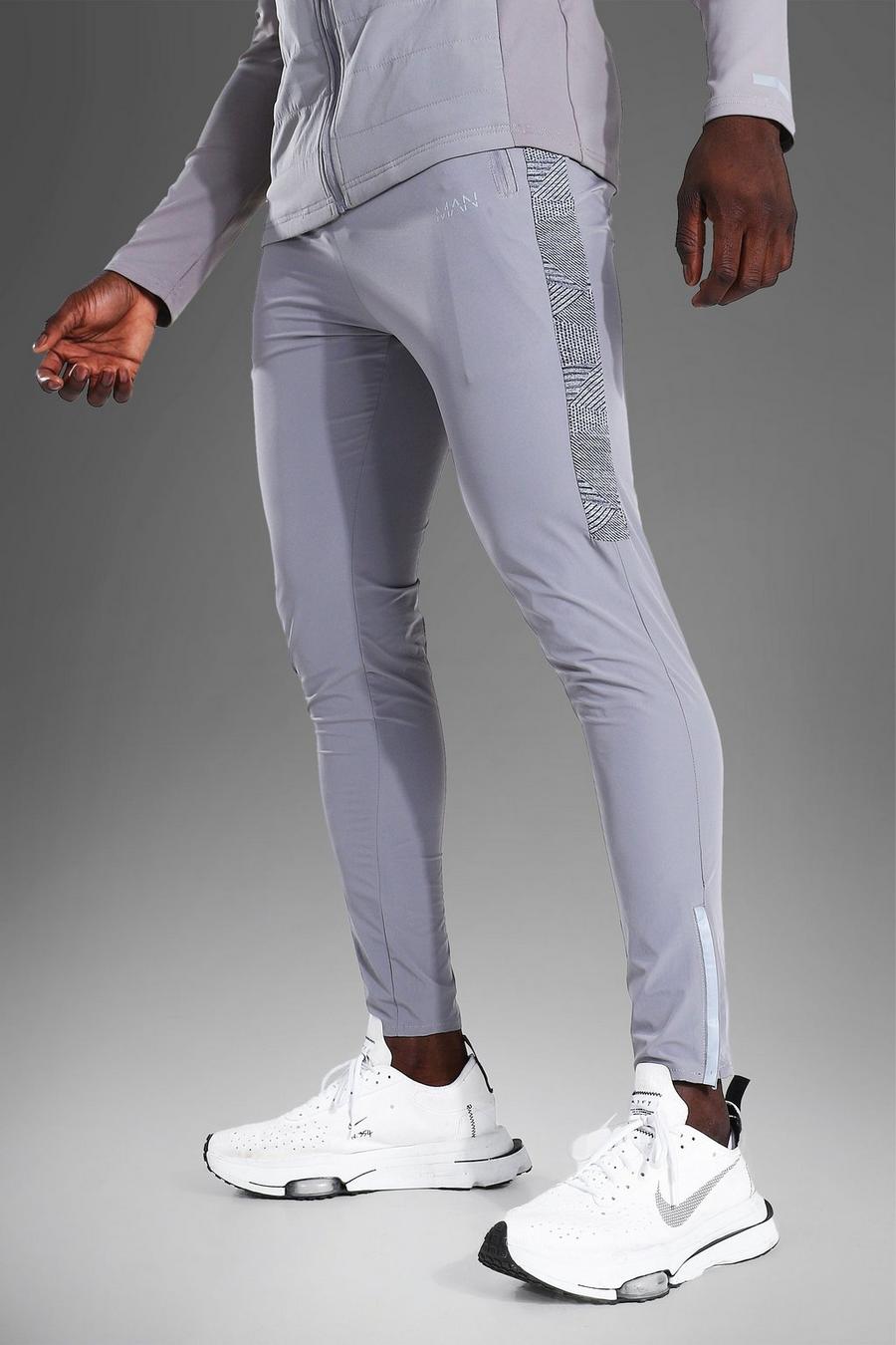 אפור מכנסי ריצה ספורטיביים קלילים עם כיתוב MAN ופס image number 1