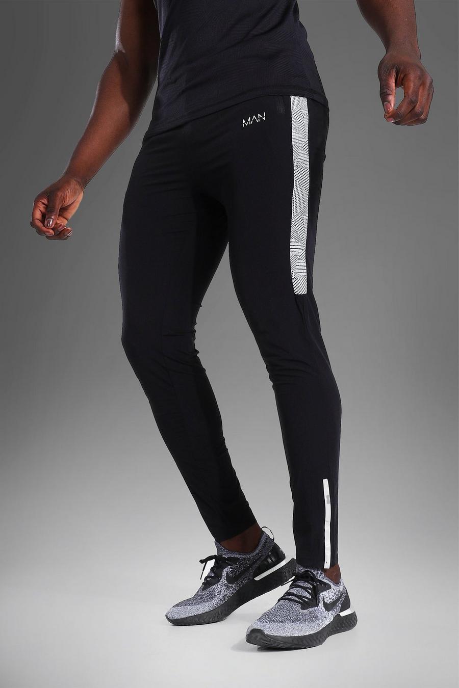 שחור מכנסי ריצה ספורטיביים קלי משקל לחדר הכושר עם כיתוב MAN ופס image number 1