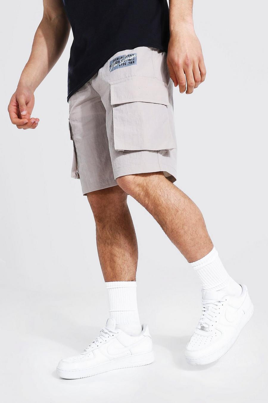 Man Cargo-Shorts mit elastischem Bund, Stone image number 1