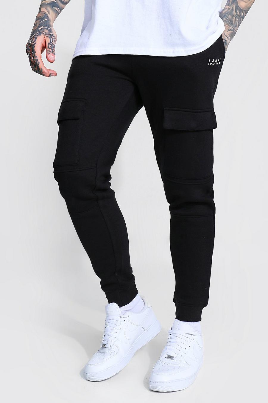Pantalones de deporte ajustados con bolsillos delanteros y paneles MAN, Negro image number 1