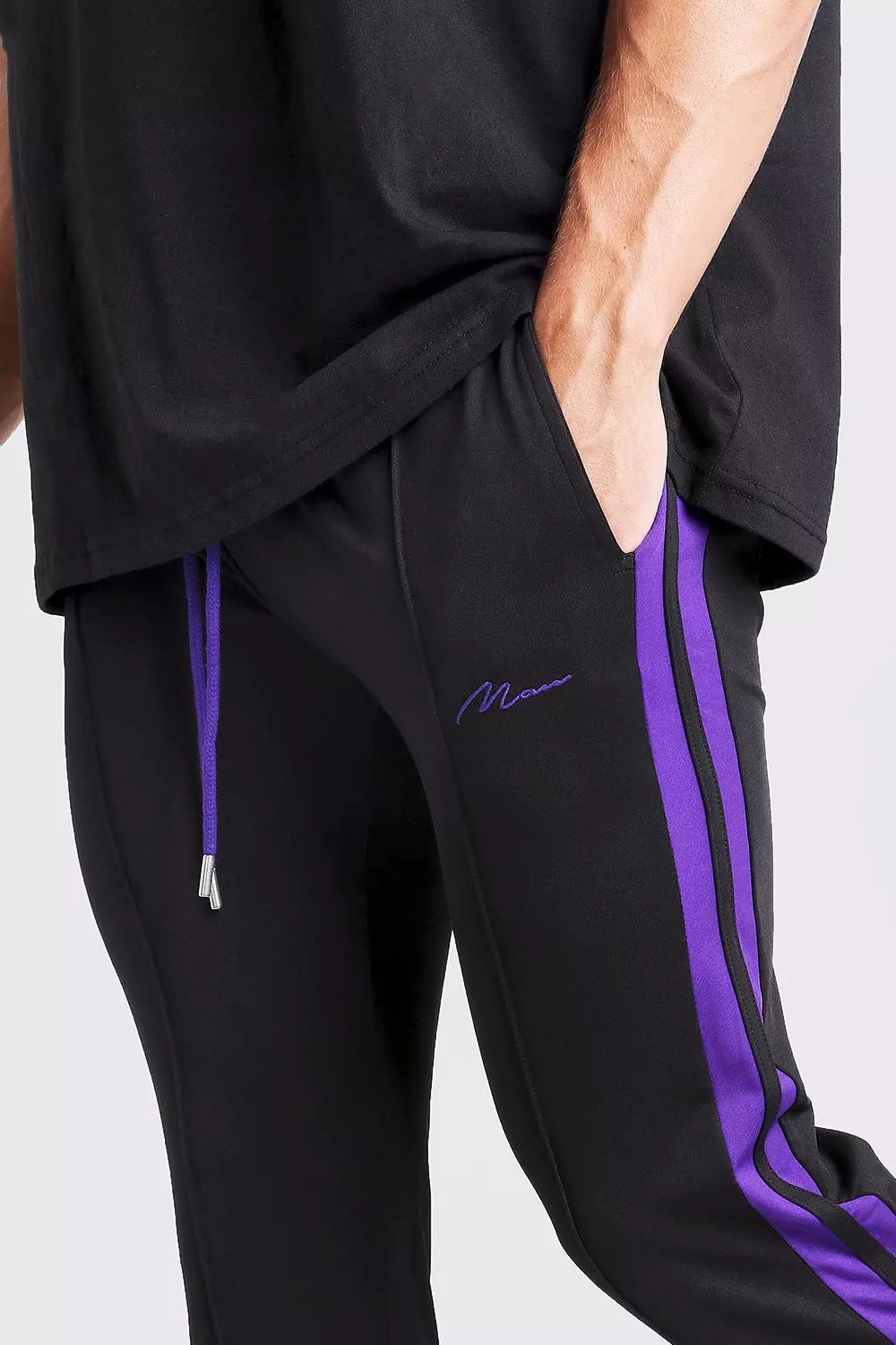 Black and purple store sweatpants