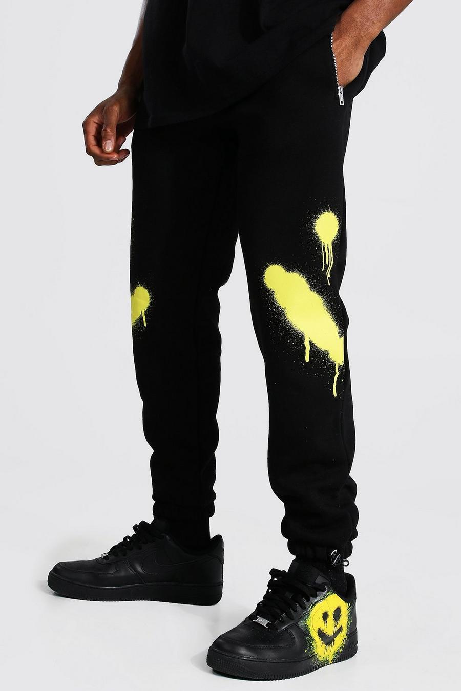 Black Regular Man Spray Face Track Pants image number 1
