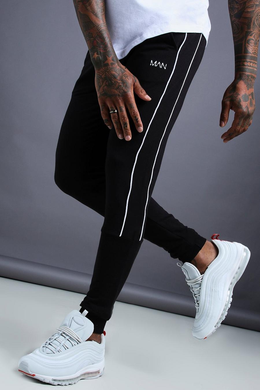 Black Man Tapered Jersey Jogger With Side Piping image number 1