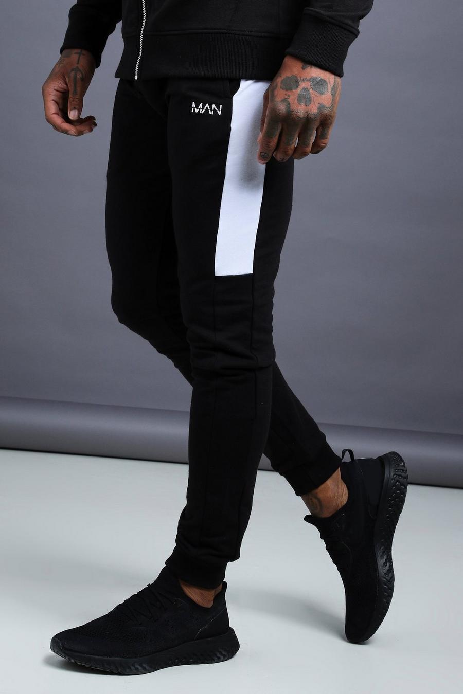 Pantalones de correr Skinny de punto con pieza lateral MAN, Negro image number 1