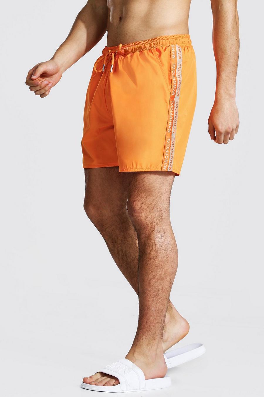 Orange MAN Mellanlånga badshorts med kantband image number 1