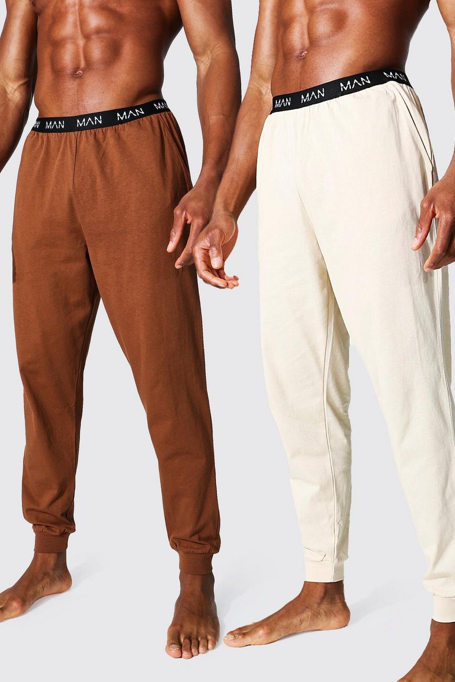 Confezione con 2 paia di pantaloni tuta per il tempo libero con scritta MAN tratteggiata, Multi image number 1