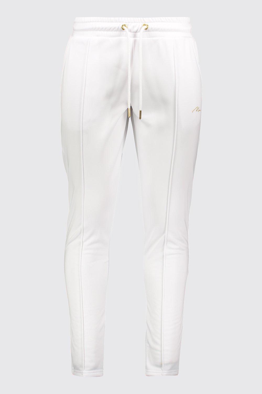 white and gold joggers