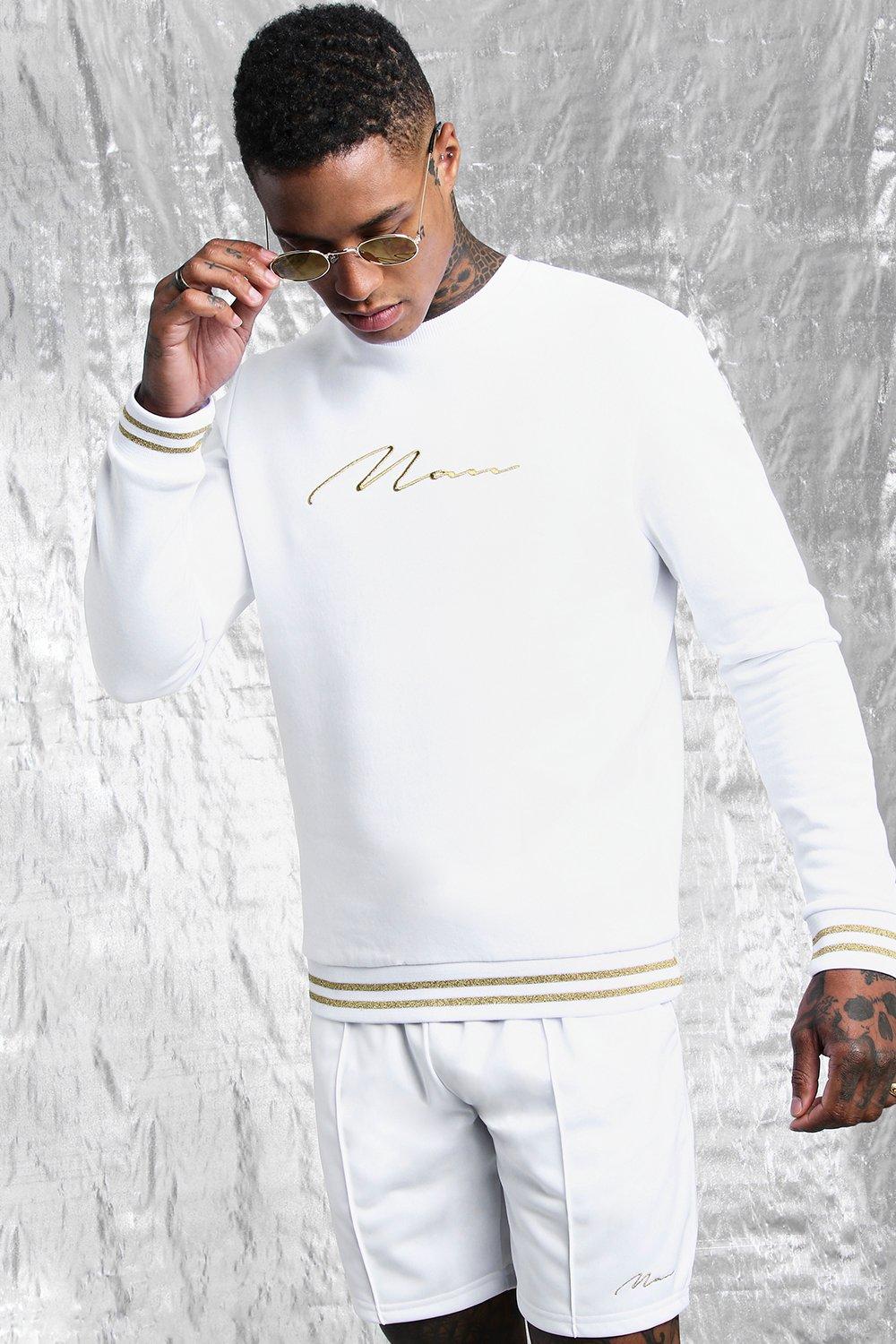 gold and white tracksuit