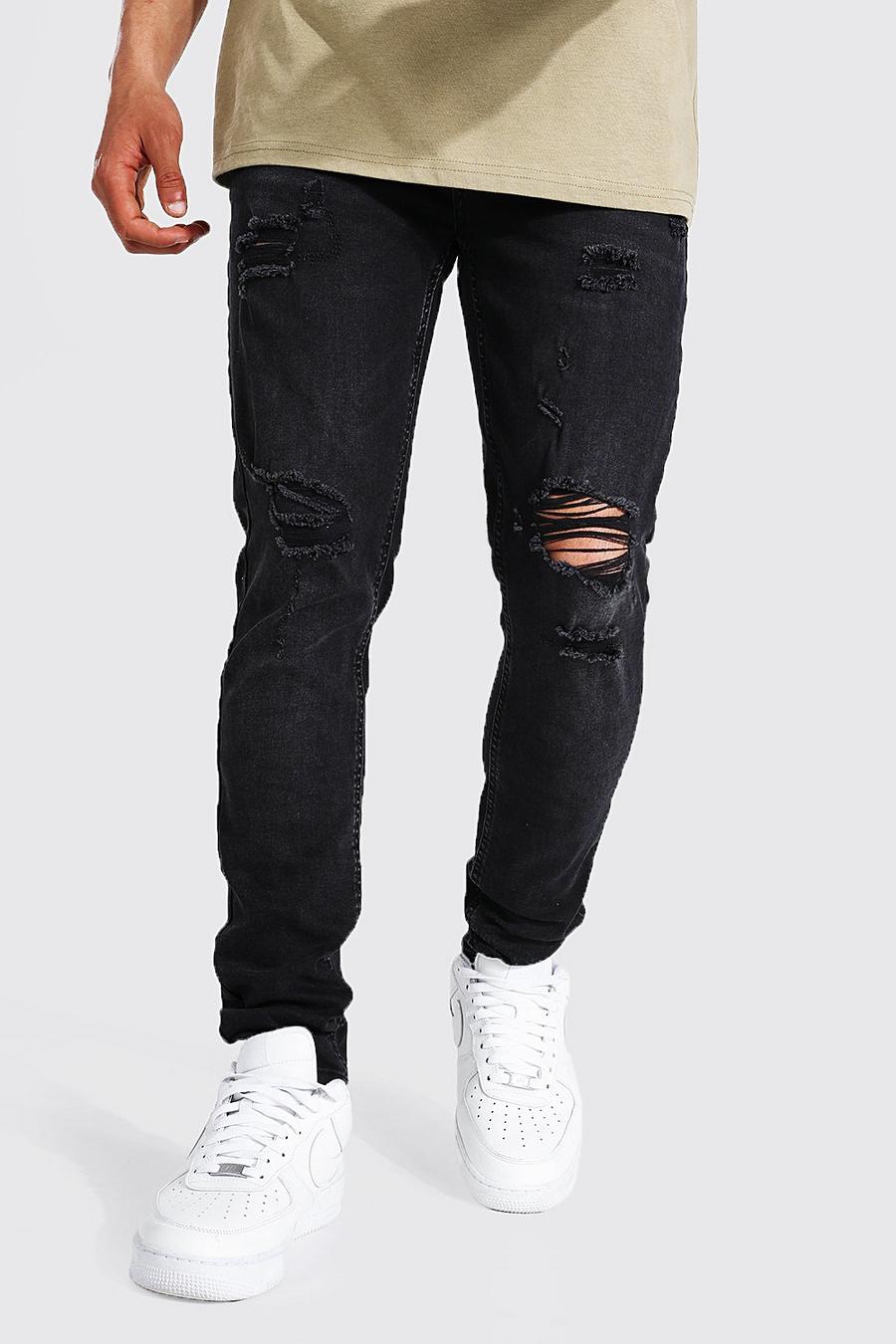 Jeans skinny elasticizzati con strappi estremi alle ginocchia, Nero effetto lavato image number 1