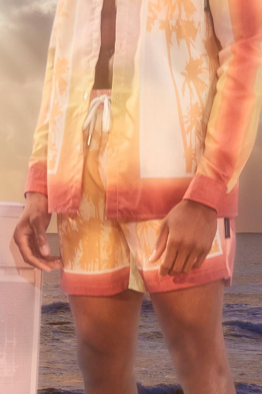 Mittellange Shorts aus Viskose mit Palmen-Bordüre, Orange image number 1