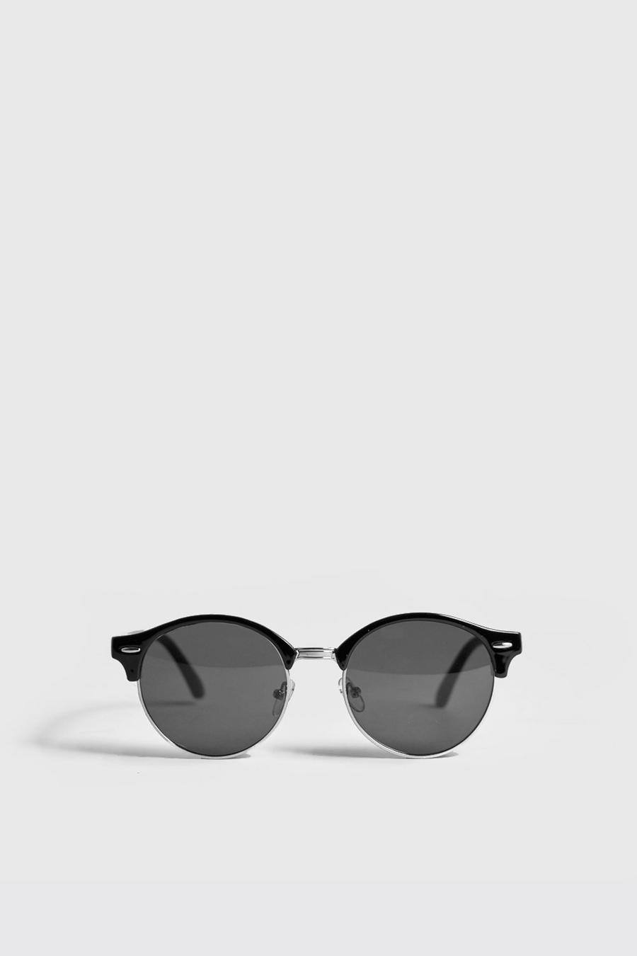 Schwarze Sonnenbrille mit runden Gläsern und goldenen Details