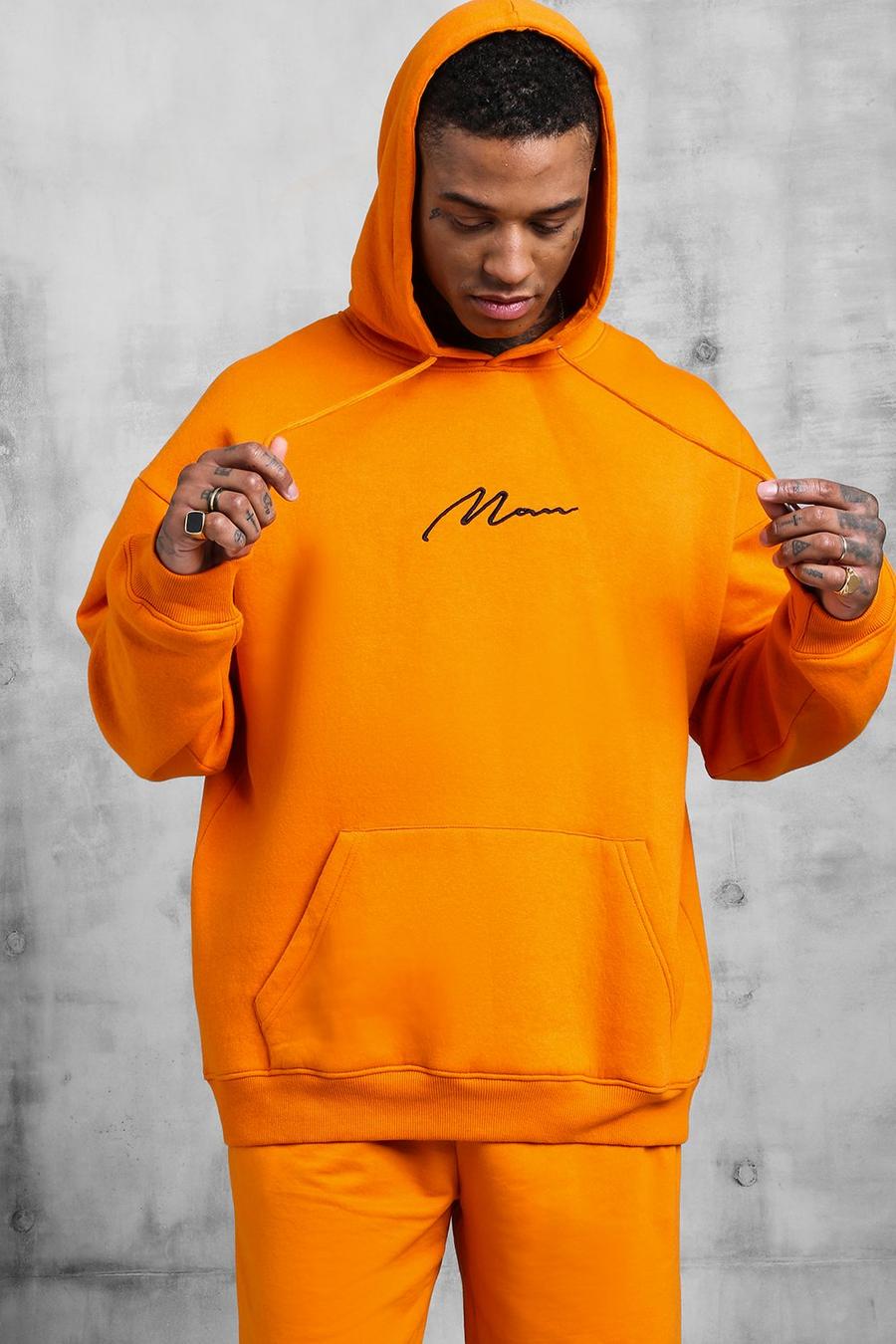 Sudadera extragrande con capucha con firma “MAN” naranja image number 1