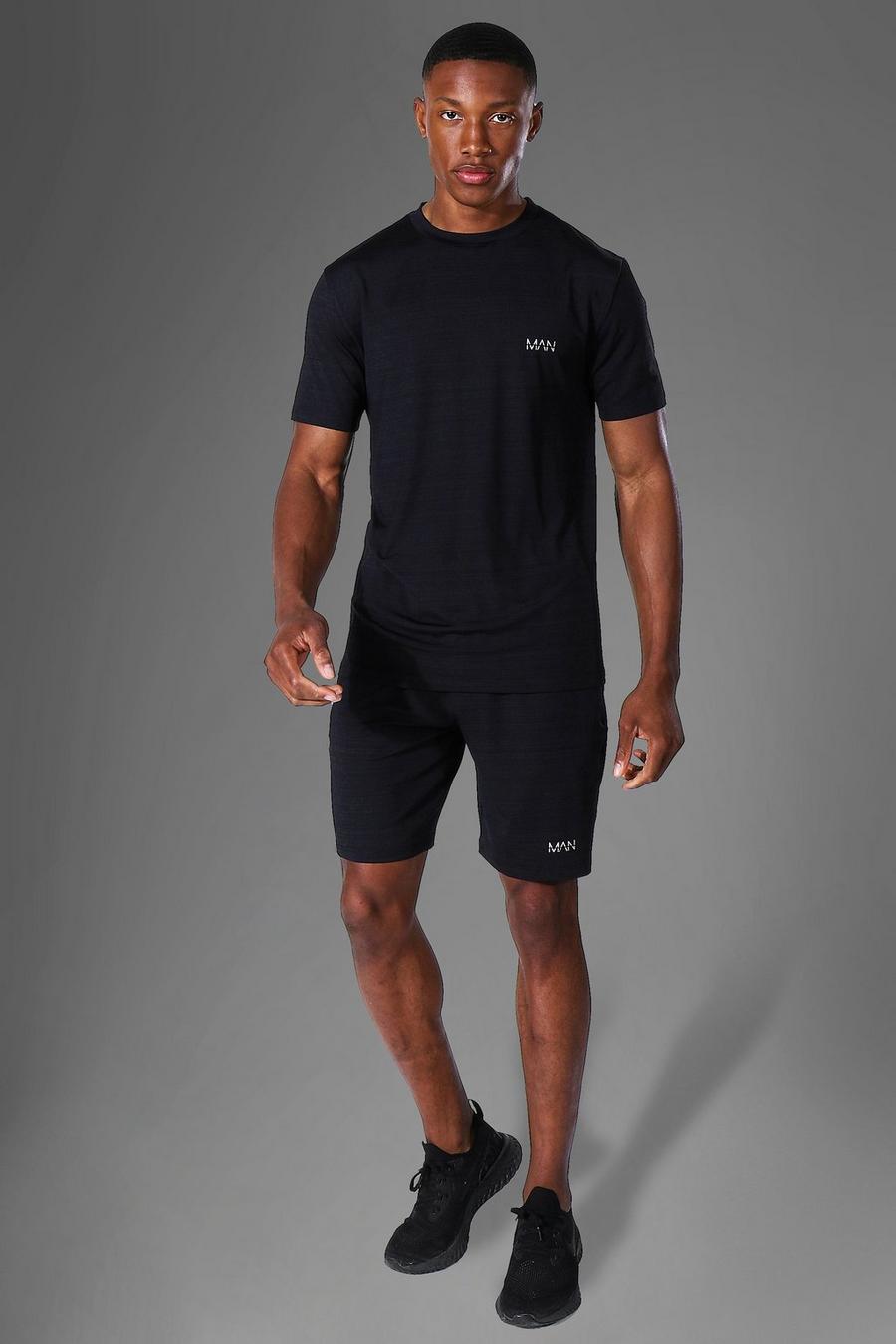 Black Man Active Mergel Trainingspak Met T-Shirt En Shorts image number 1