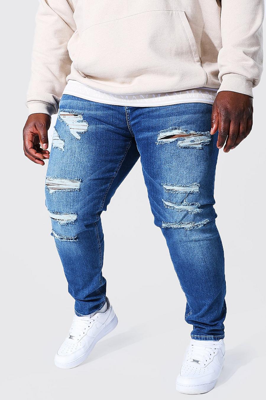 כחול ביניים סקיני ג'ינס עם קרעים מרובים וקרע גדול בברך, מידות גדולות image number 1