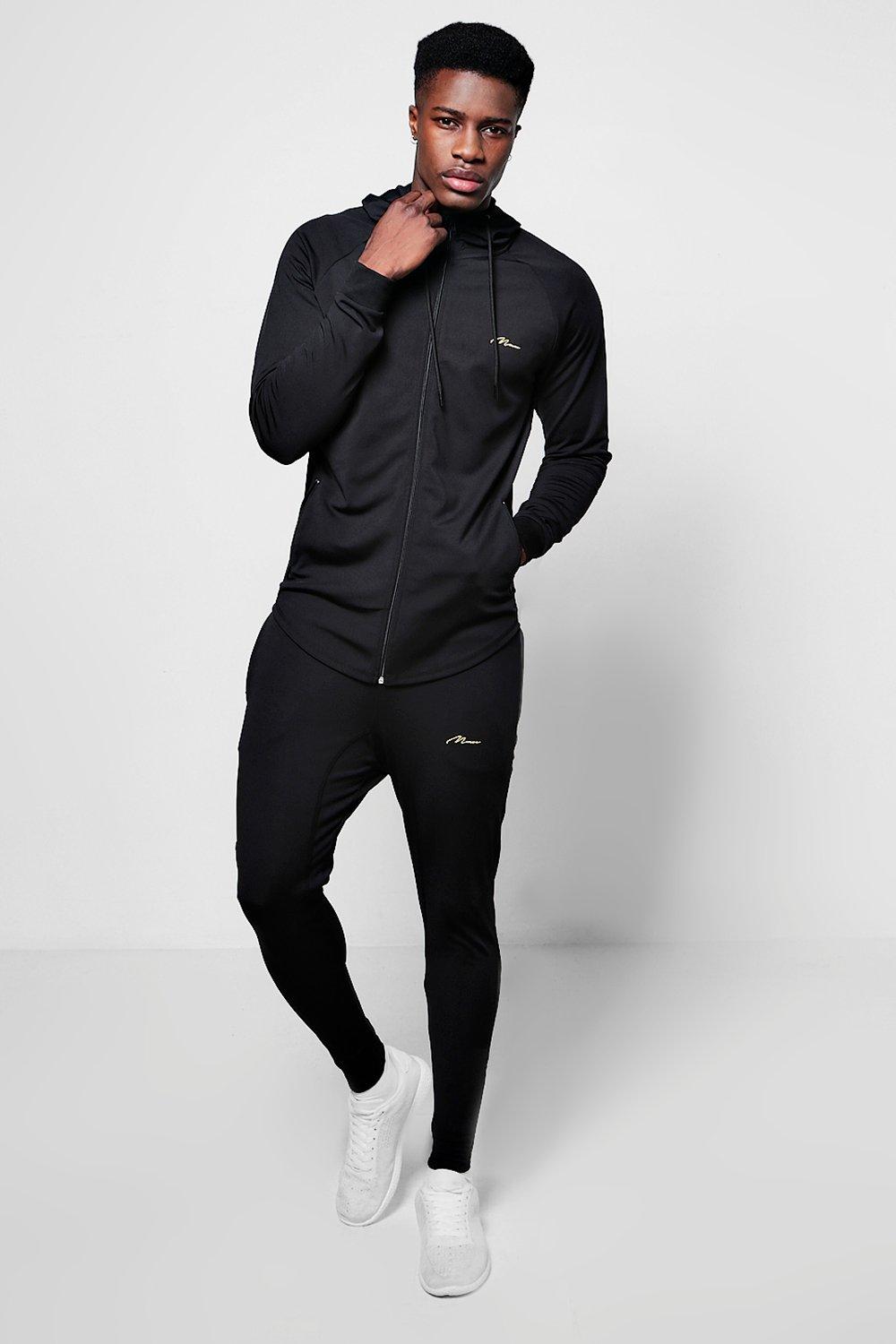 nike muscle fit tracksuit