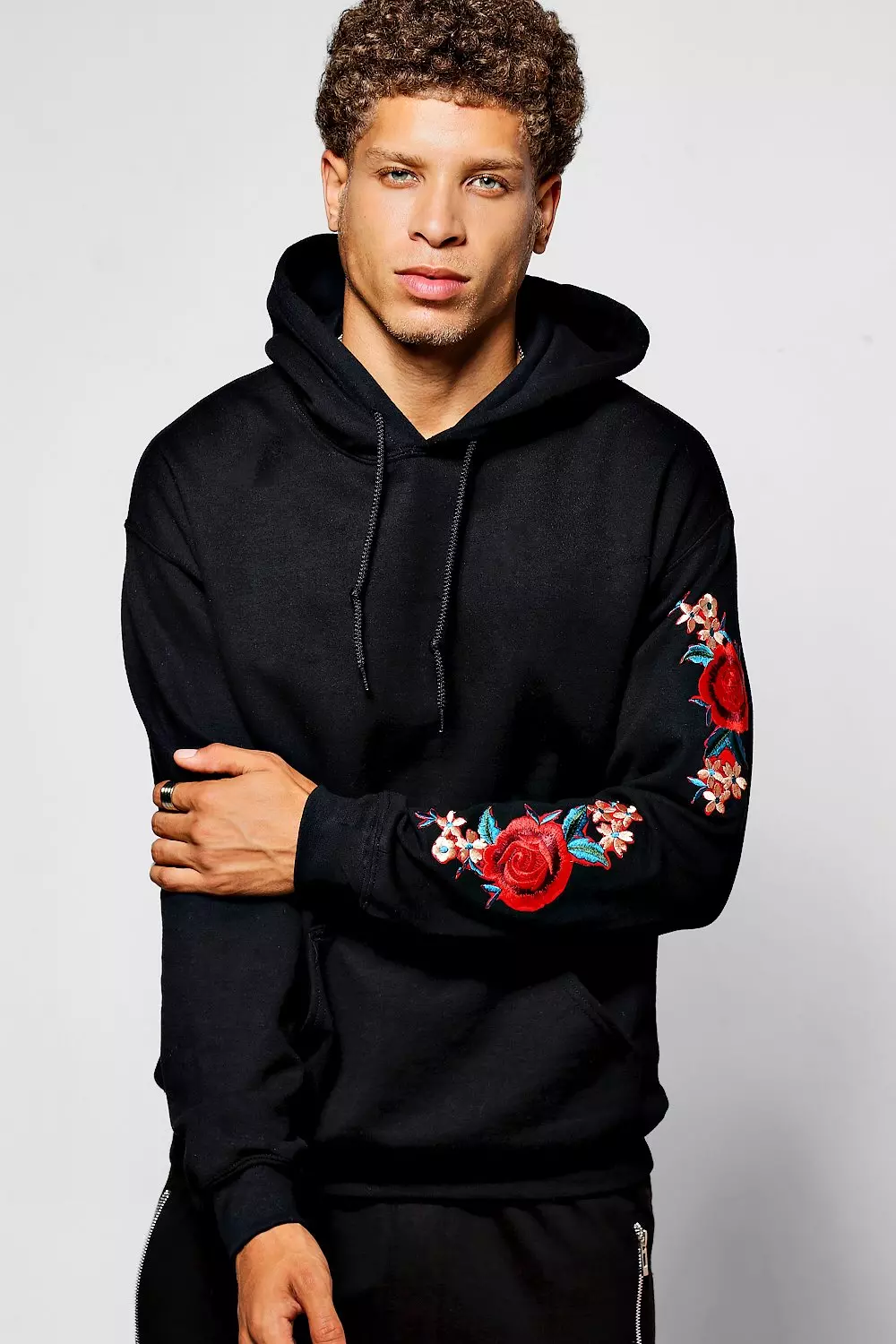 Black hoodie with store roses on sleeves mens