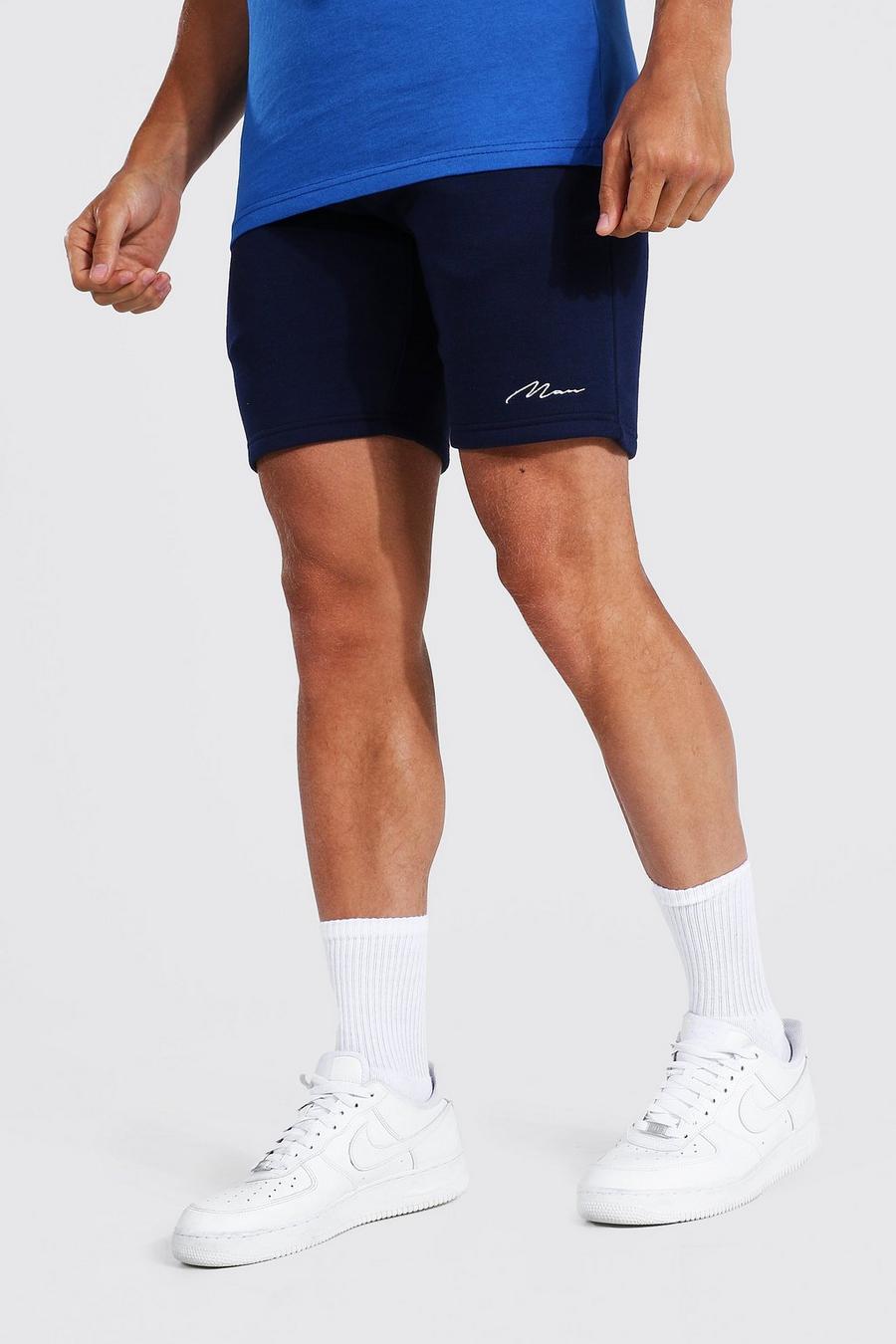 Navy Recycled Man Signature Slim Jersey Shorts image number 1