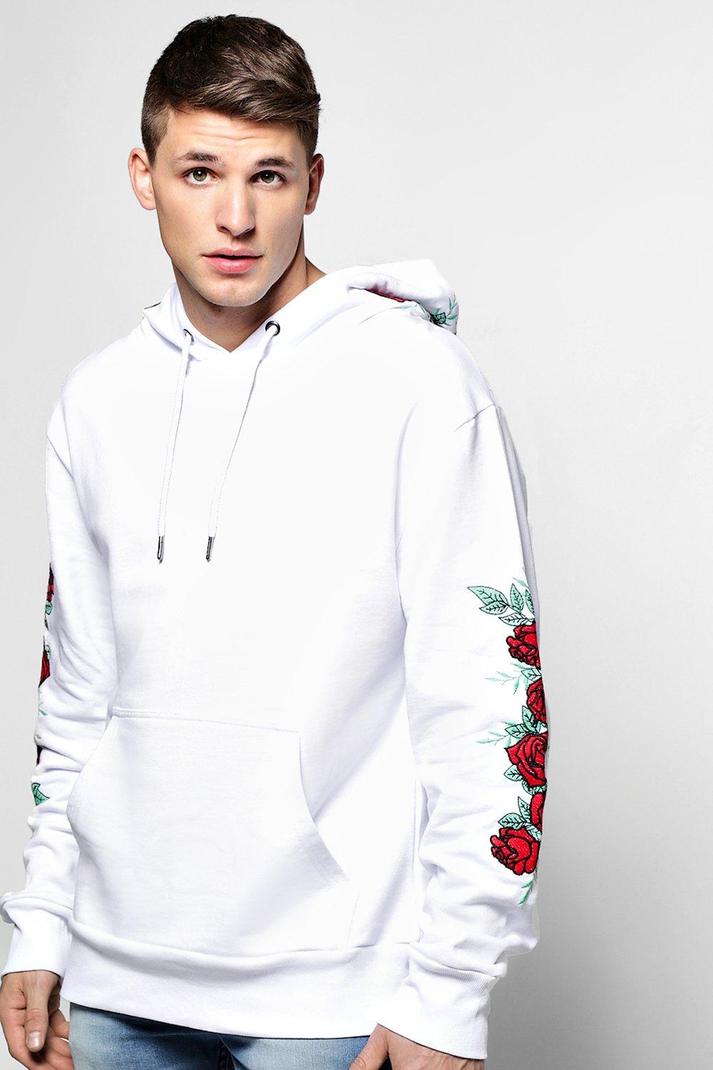 white hoodie with roses on sleeves