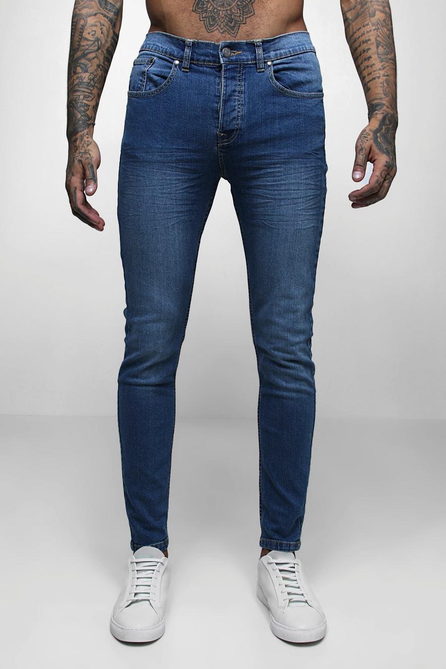 סקיני ג'ינס בצבע כחול ביניים דהוי