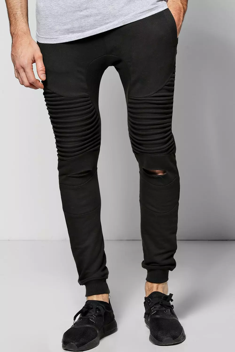 Black ripped joggers on sale