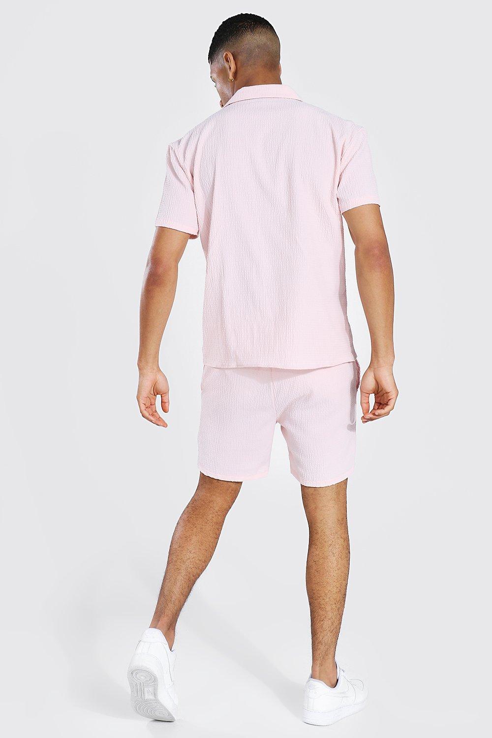 Conjunto de corto y camisa de sirsaca rosa con solapas