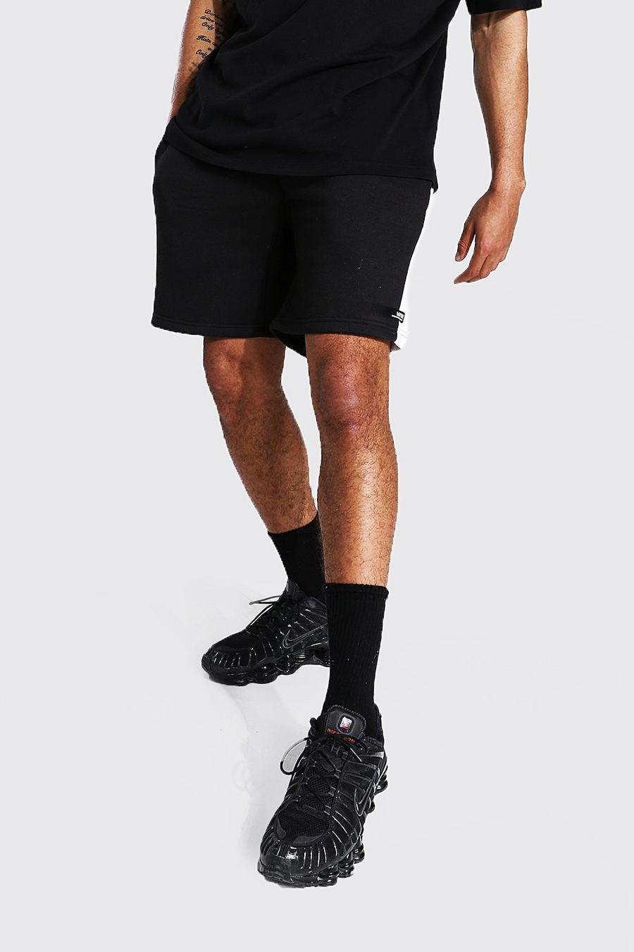 Black Regular Man Tab Side Panel Jersey Shorts image number 1