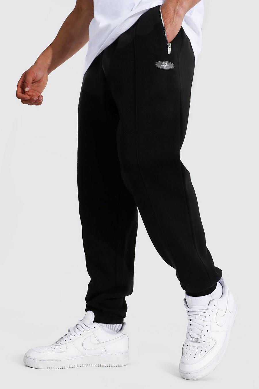 שחור מכנסי ריצה בגזרה רגילה עם קפל ותווית עם כיתוב Original Man image number 1
