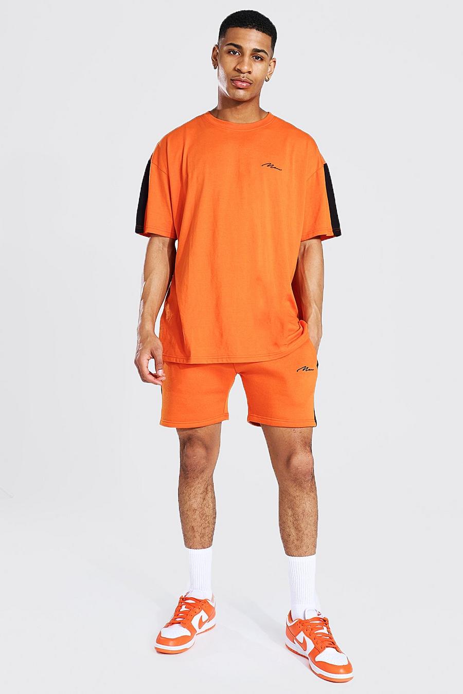 Übergroßes Set mit T-Shirt und Shorts mit seitlichem Einsatz mit Man-Print, Orange image number 1