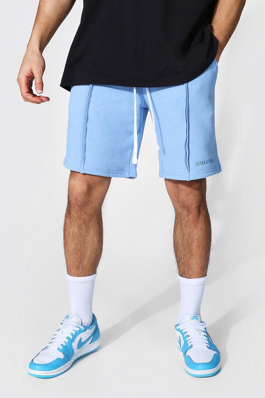 Pantalones cortos de punto holgados con bajo dividido Official MAN, Azul pálido image number 1