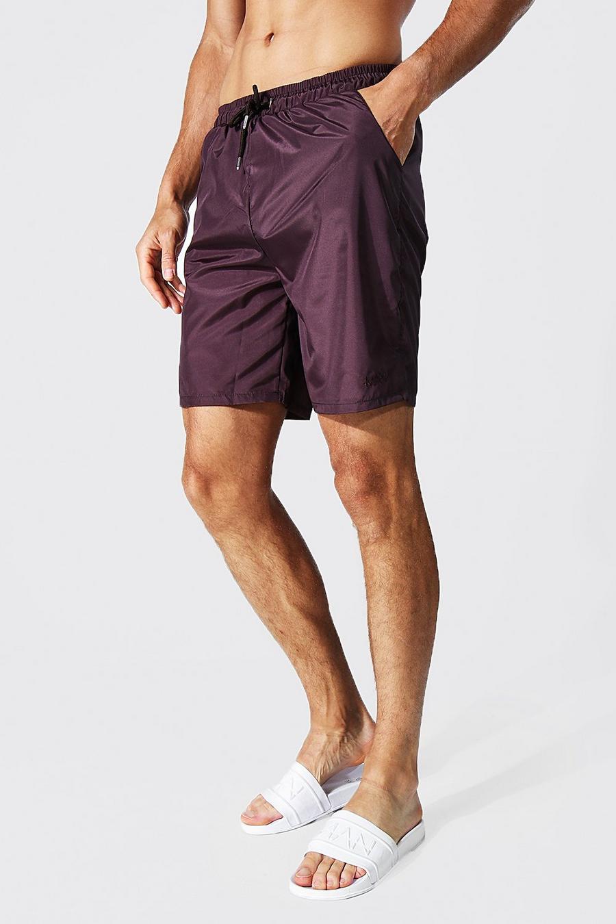 Chocolate Tall Tonal Man Embroidered Mid Swim Short image number 1