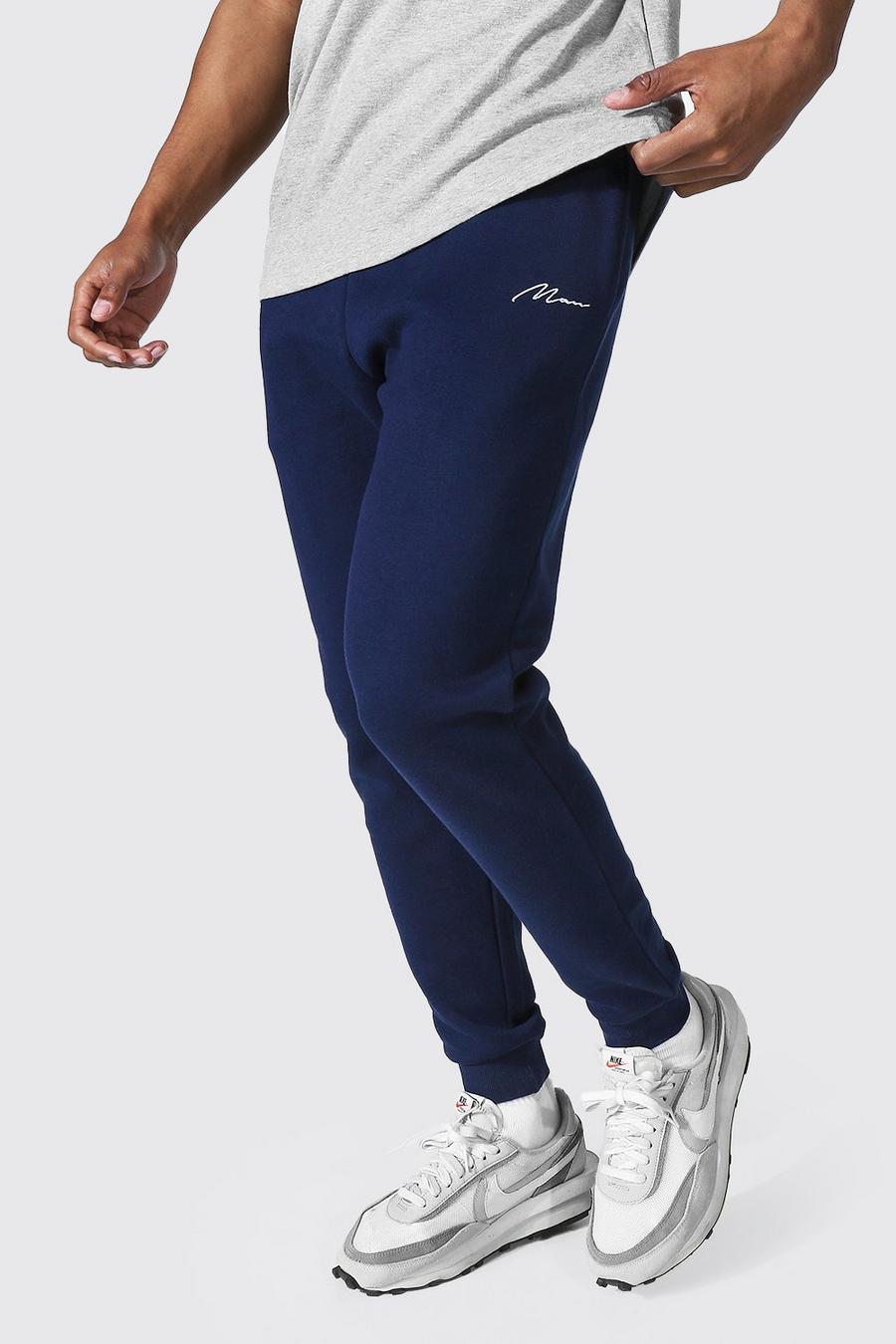 Navy Recycled Man Signature Slim Fit Track Pant image number 1