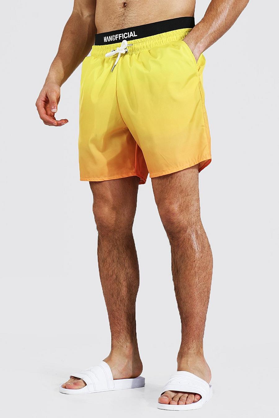 צהוב שורט בגד ים באורך בינוני בגוני אומברה עם כיתוב Man Official image number 1