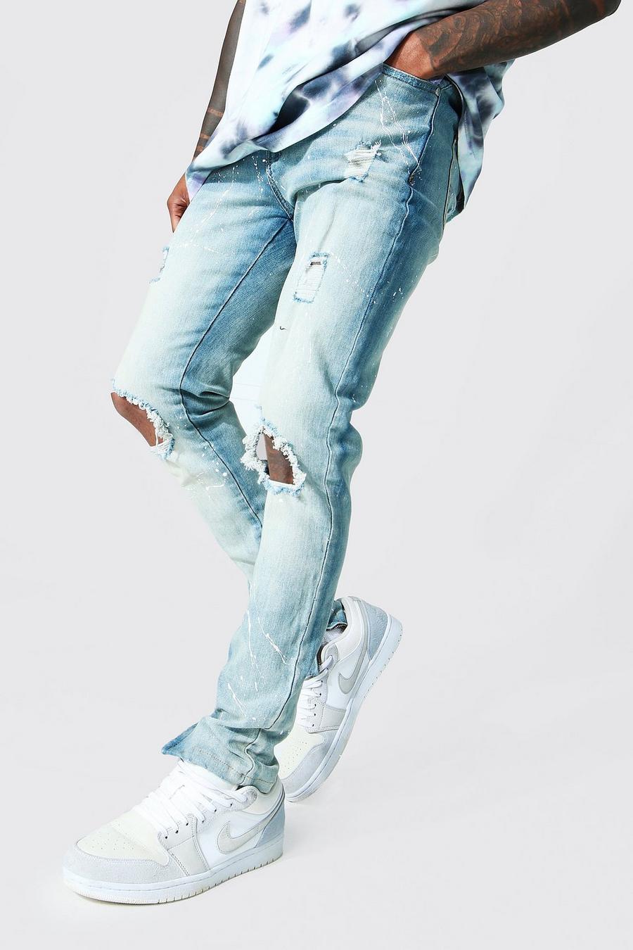 כחול בהיר סקיני ג'ינס סטרץ' עם קרעים גדולים בברכיים ונתזי צבע image number 1