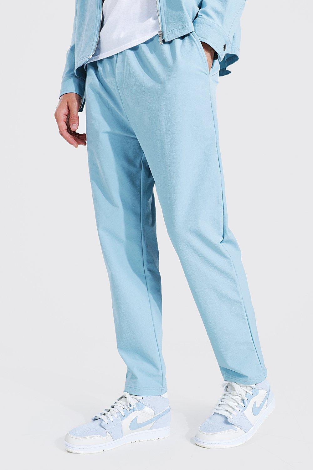 Pale blue بنطلون بتصميم مدبب وحزام خصر مطاطي