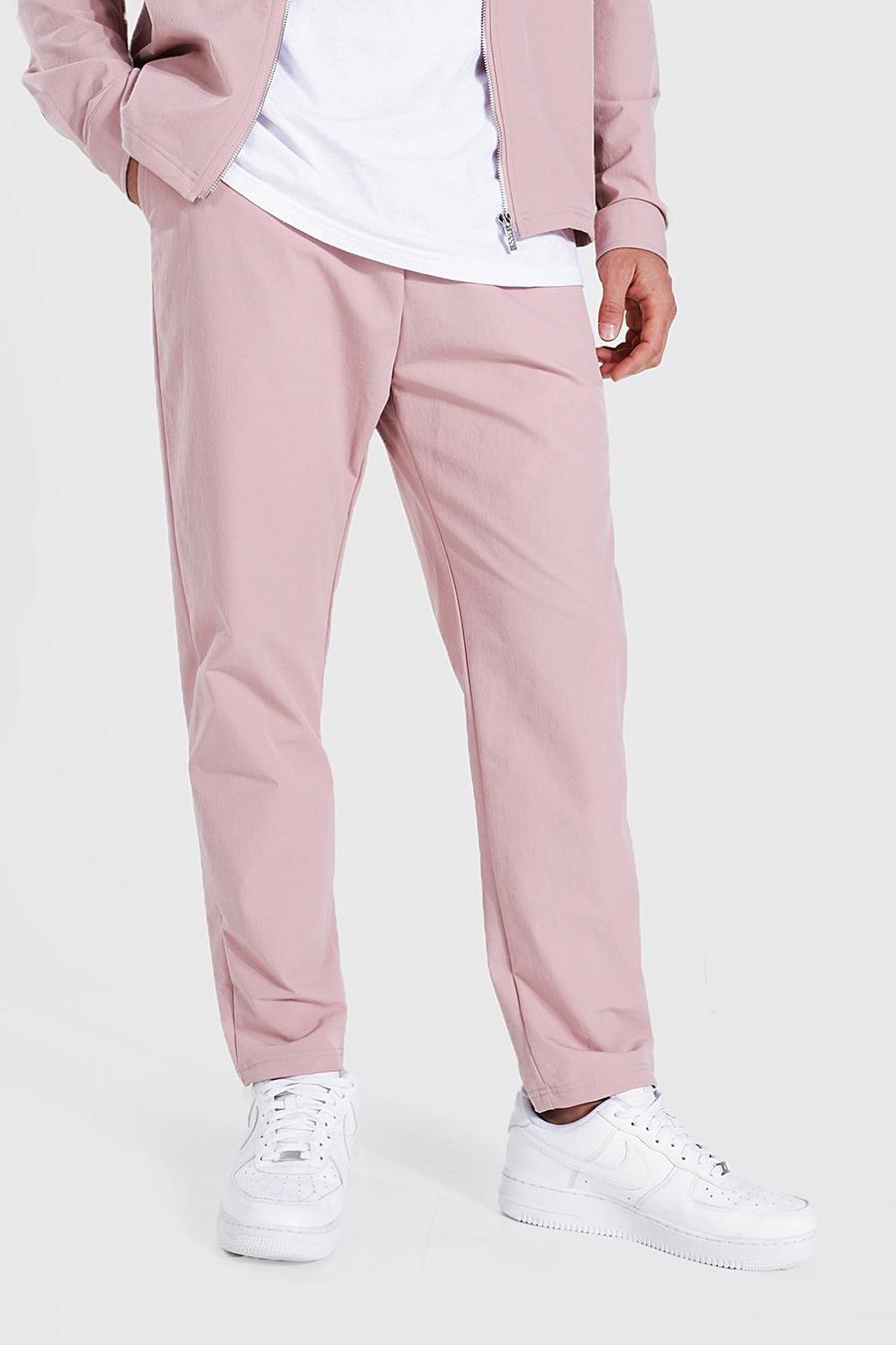 Pale pink Byxor med elastiskt midjeband och avsmalnande ben image number 1