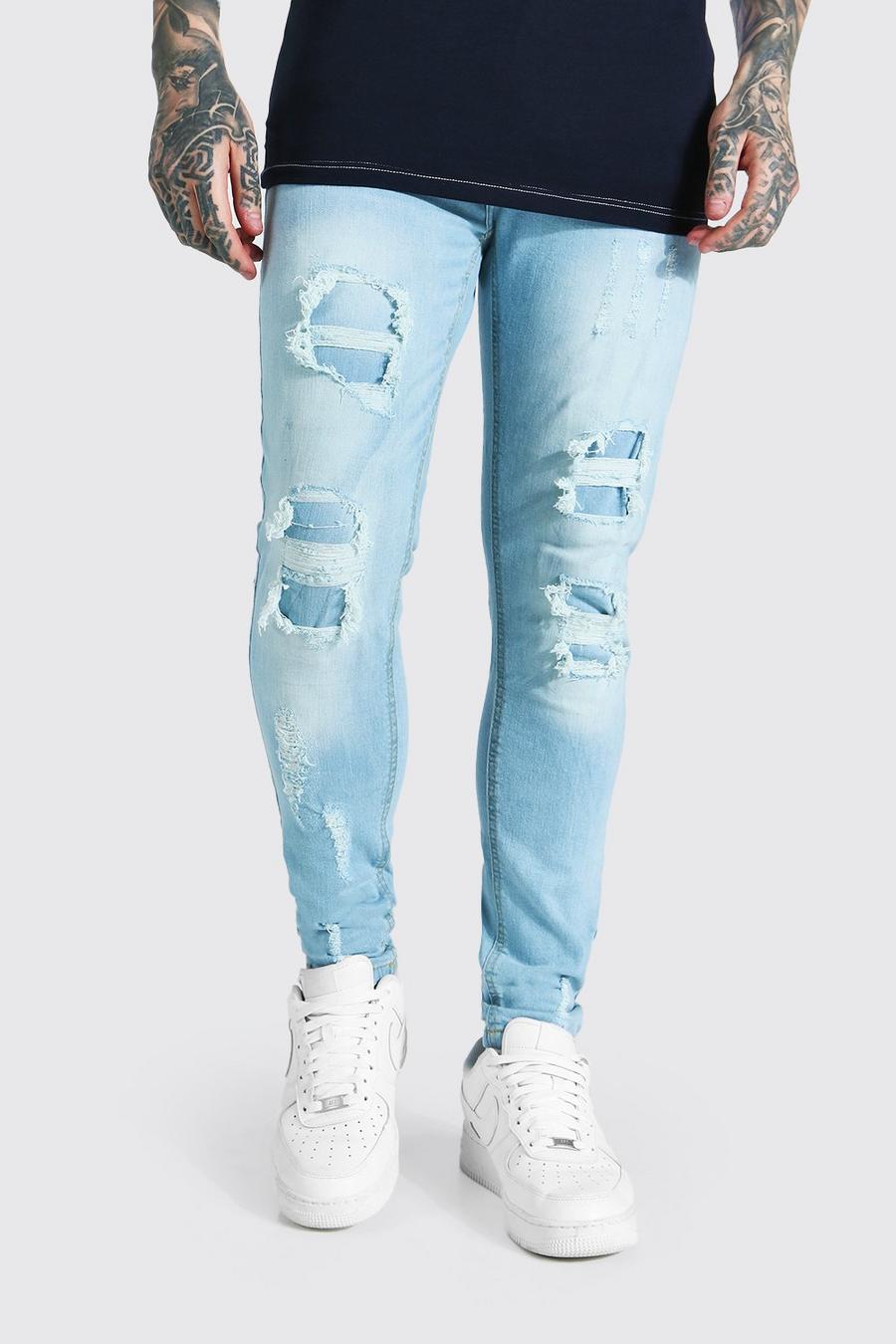 כחול קרח סקיני ג'ינס סטרץ' עם קרעים, טלאים ושפשופים image number 1