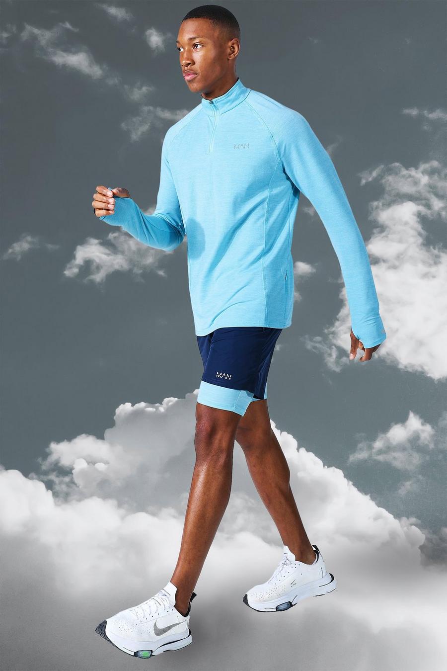 Light blue blå MAN Active Tröja med kort dragkedja och shorts image number 1