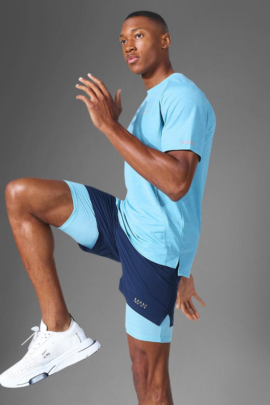 Light blue MAN Active Set med shorts i kontrastfärger image number 1