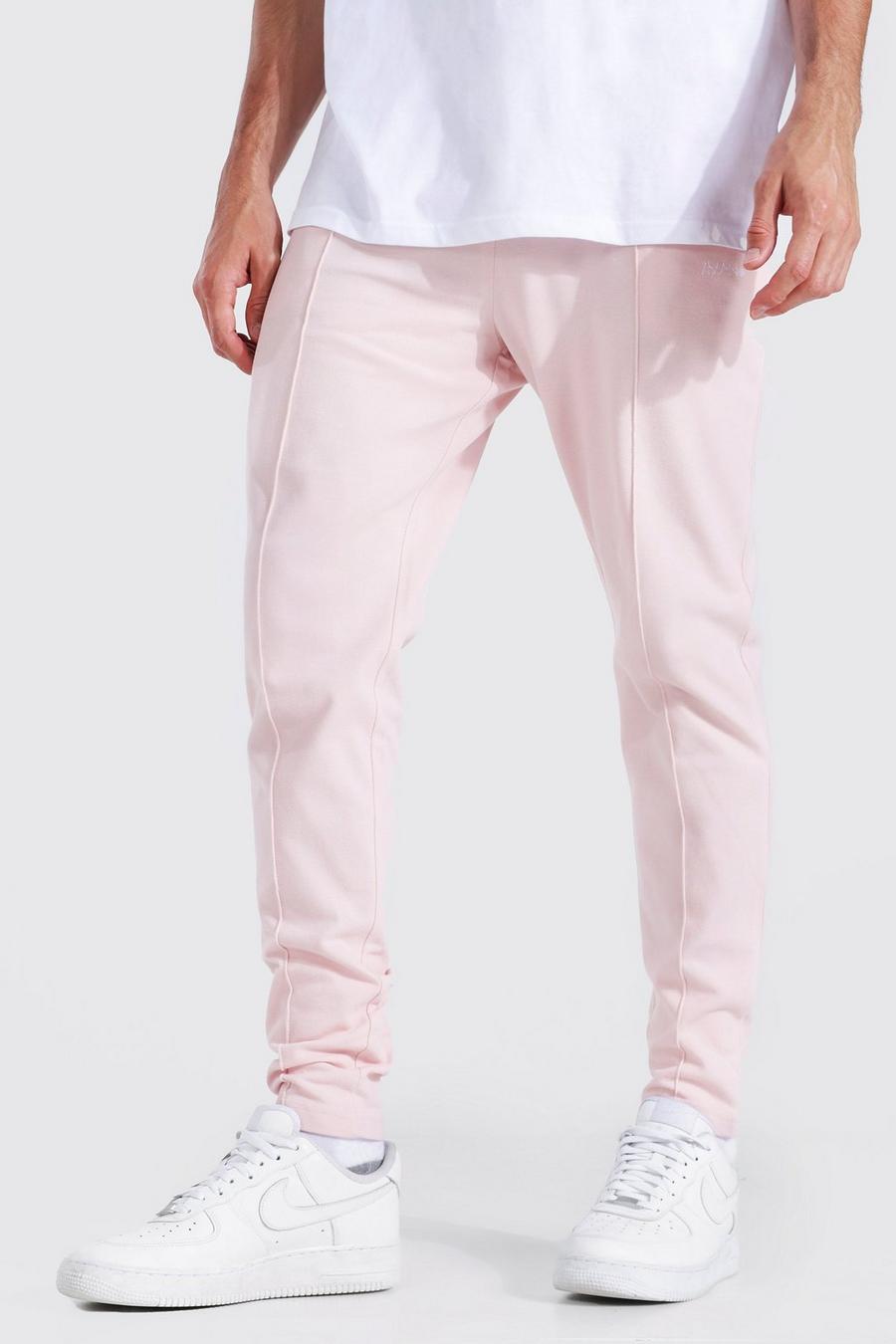 Pantaloni tuta Man Slim Fit in piqué con nervatura, Powder pink image number 1