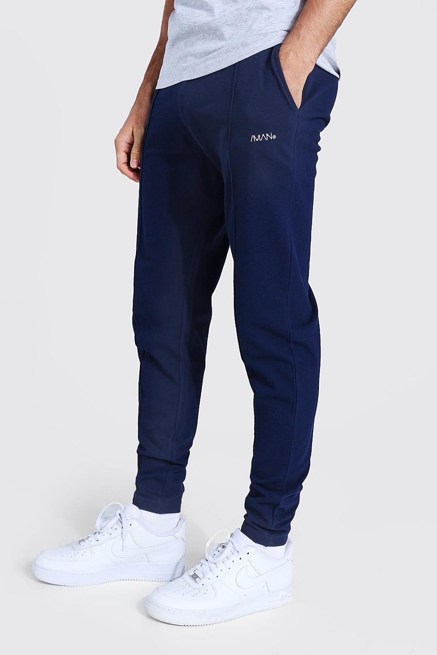 Navy Slim Fit Man Pique Pintuck Joggers image number 1