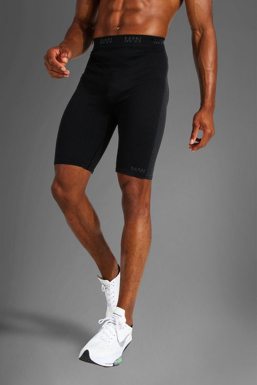 Pantalón corto de ciclista MAN Active sin costuras, Black image number 1