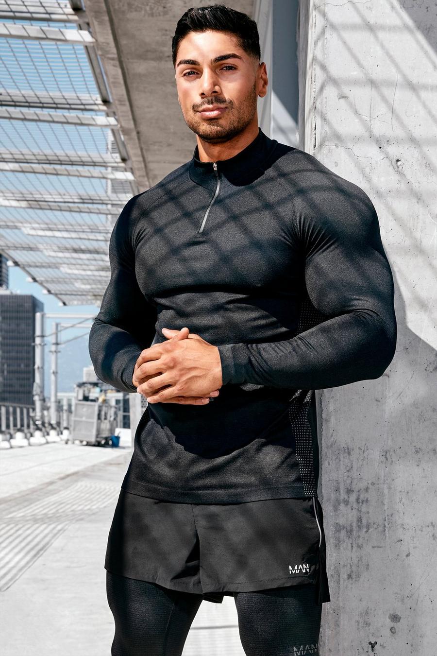 Black MAN Active Sömlös tröja med kort dragkedja image number 1
