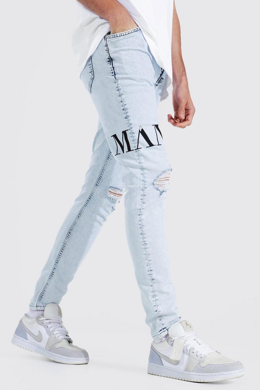 Jeans Man Skinny Fit elasticizzati con stampa e strappi sul ginocchio, Ice blue image number 1
