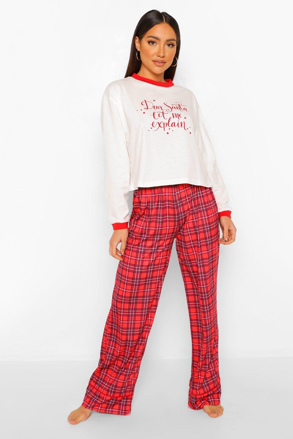 Pajamas set on white background, women's plaid pajama pants and a