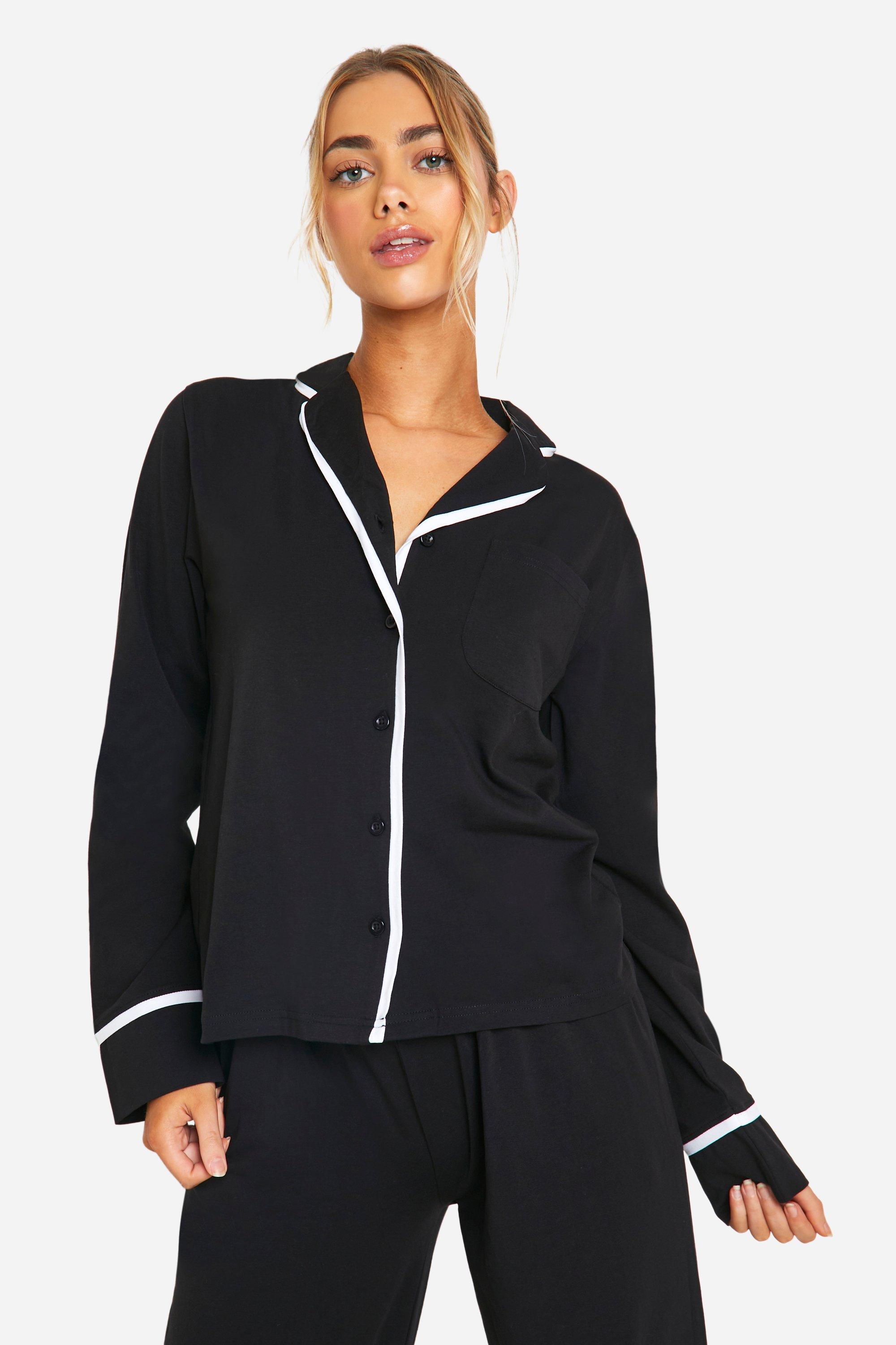 https://media.boohoo.com/i/boohoo/nzz89649_black_xl_3/female-black-long-sleeve-button-through-jersey-knit-pj-set