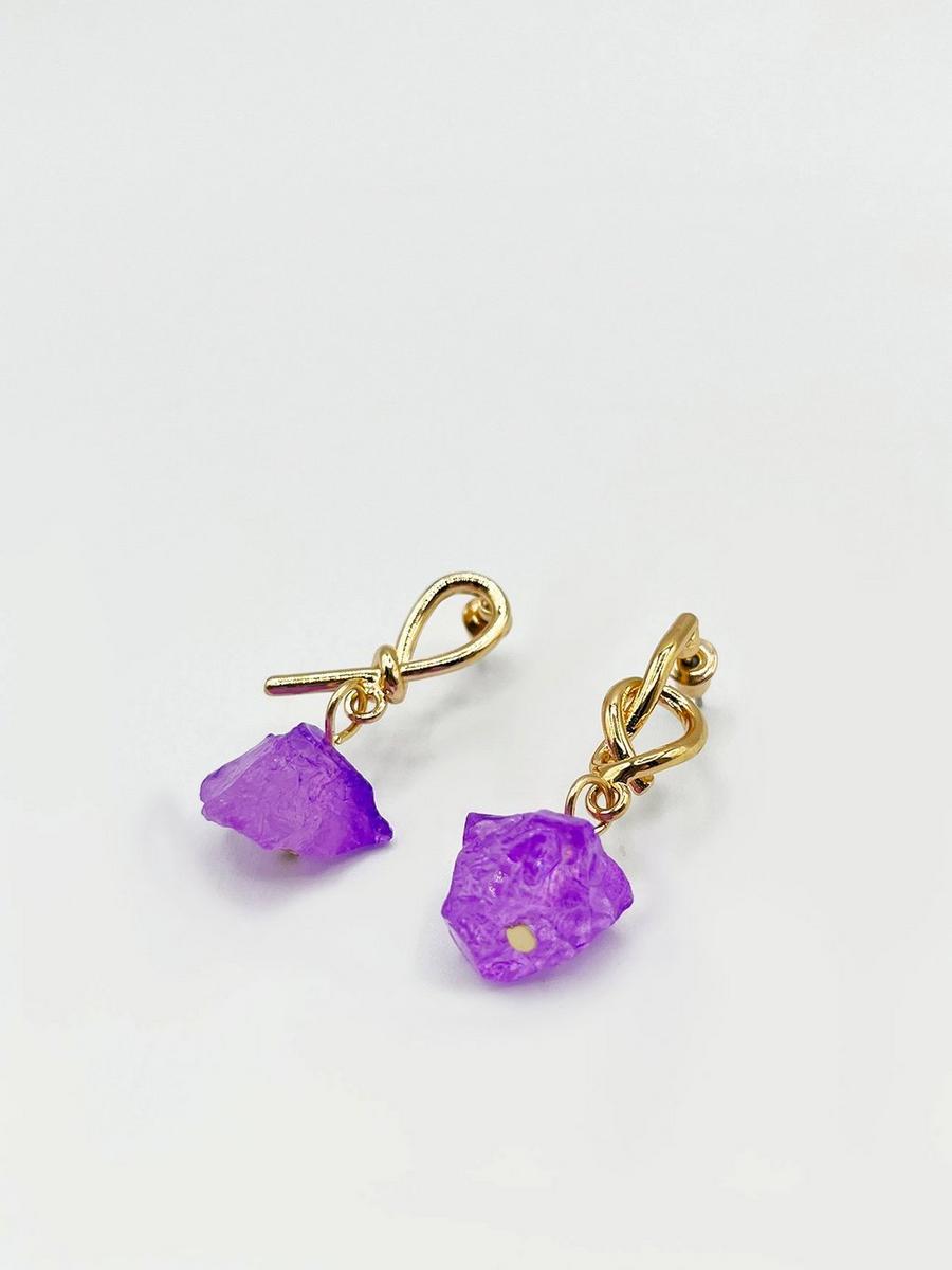 Gold earrings with purple crystal