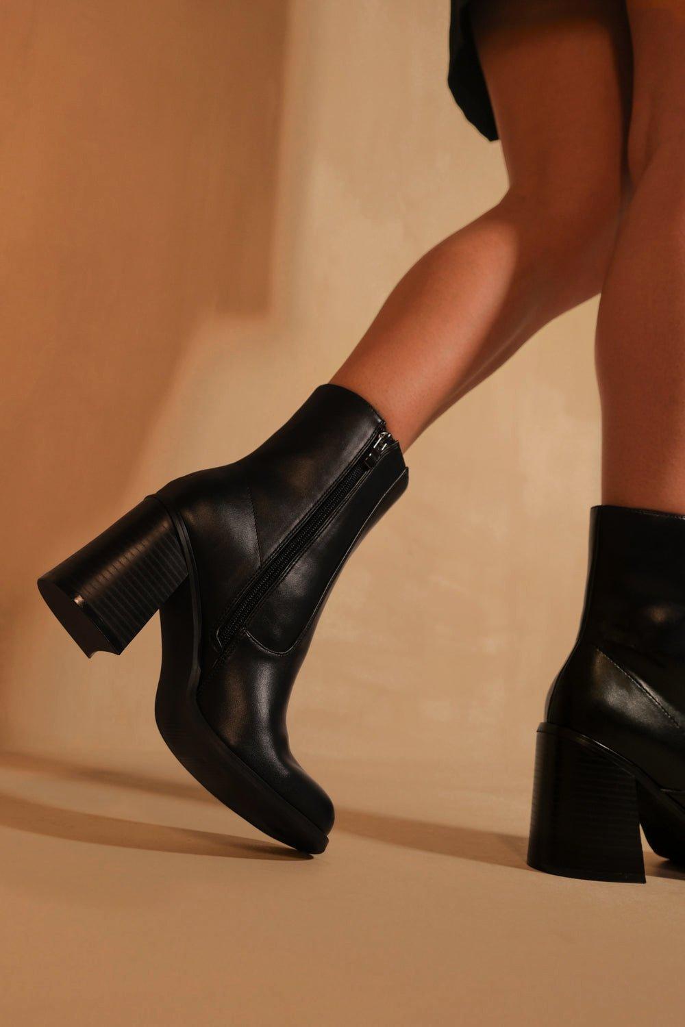 Mid shaft black leather boots hotsell