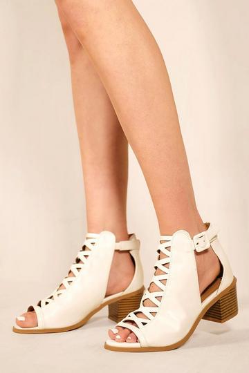 'Reydah' Mid High Block Heel Sandals With Peep Toe & Criss Cross Detail White