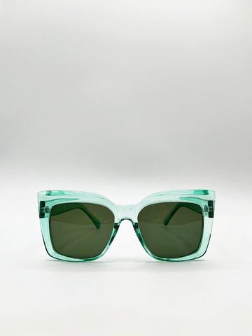 Clear plastic frame cat eye style sunglasses Green